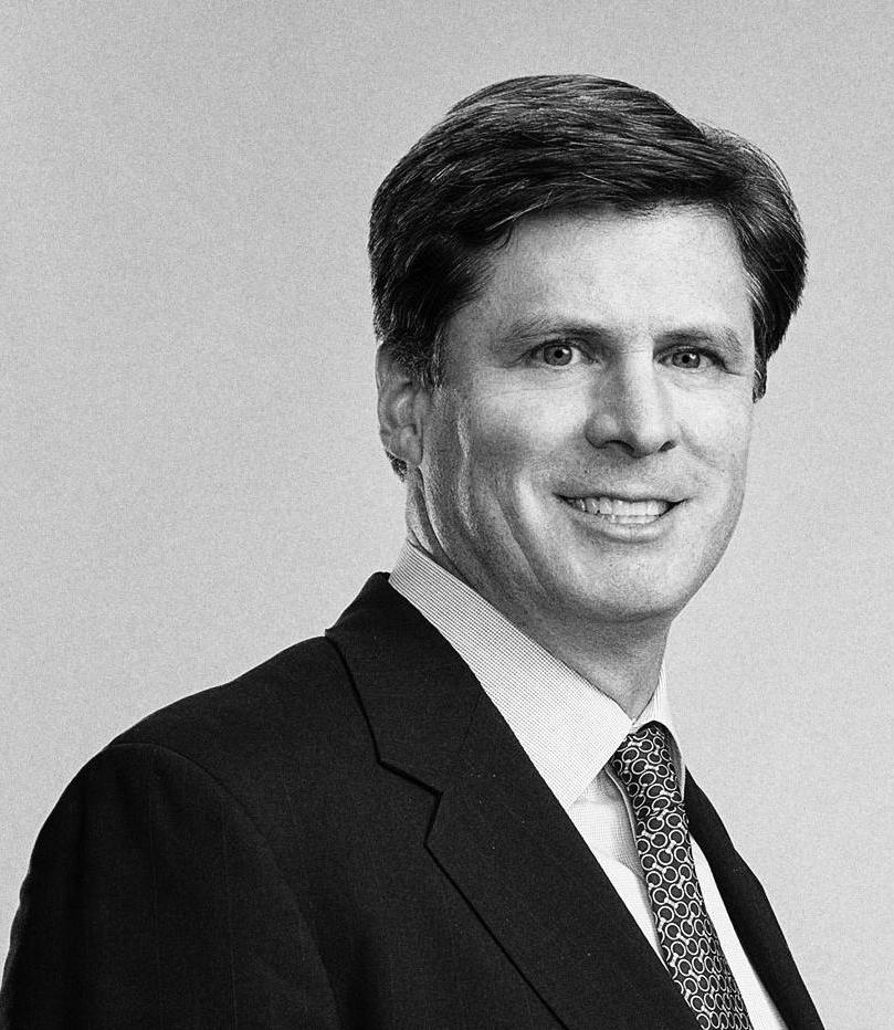 Headshot photo of Patrick J. Devine